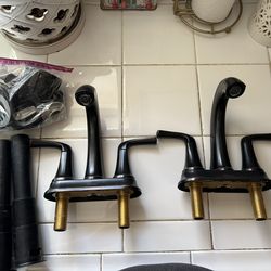 Two Pfister Bathroom Faucets