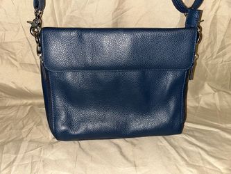 Purse with pew-pew compartment