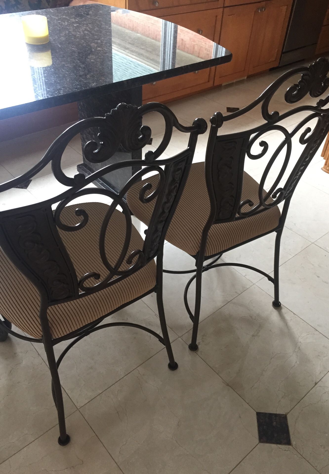 Two kitchen wrought iron chairs. Normal used wear