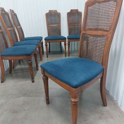 6 Vintage Dining Chairs for $100. Gold Metal Adornment at top of each chair.  Clean Blue Cushioned Seats.  19" seat height 