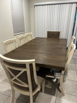 Long farm style dining table and chairs and bar stools