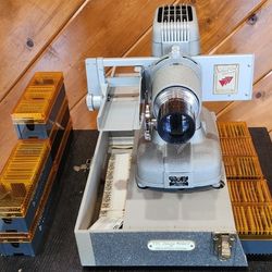1 Owner Bell & Howell TDC Vivid Selectron Model D Slide Projector in original case.