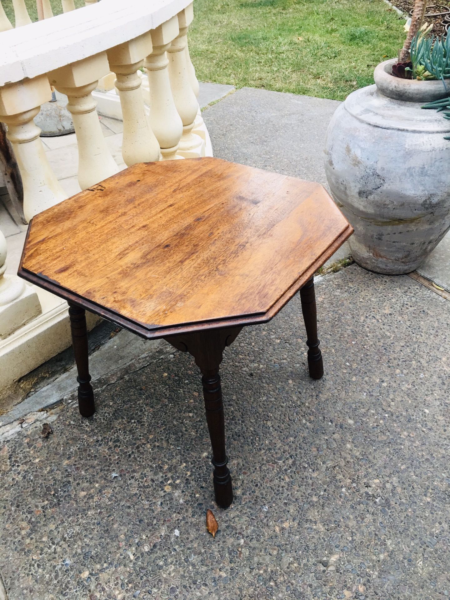 Beautiful antique side table .28” across and 24” height.