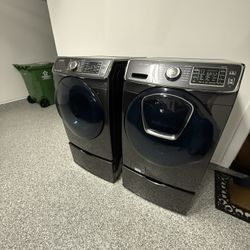 Samsung front Loading Steam Washer And Gas Dryer With Pedestals