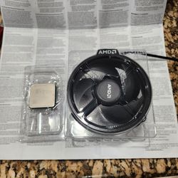 Ryzen 5 2600 With Wraith Cooler. 