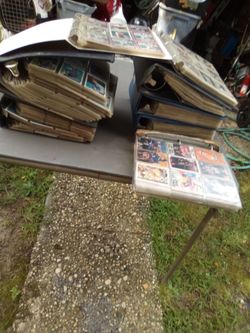 Base ball  cards 7 binders  tops 1 binder of  basketball hoops and a card board box full of  card's