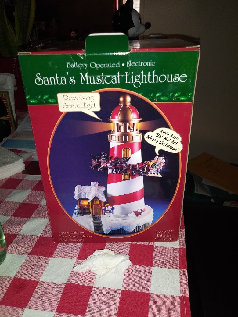Christmas thing santa musical lighthouse new in box n i have not in box 15.00 for the one n 10.00 the not in box