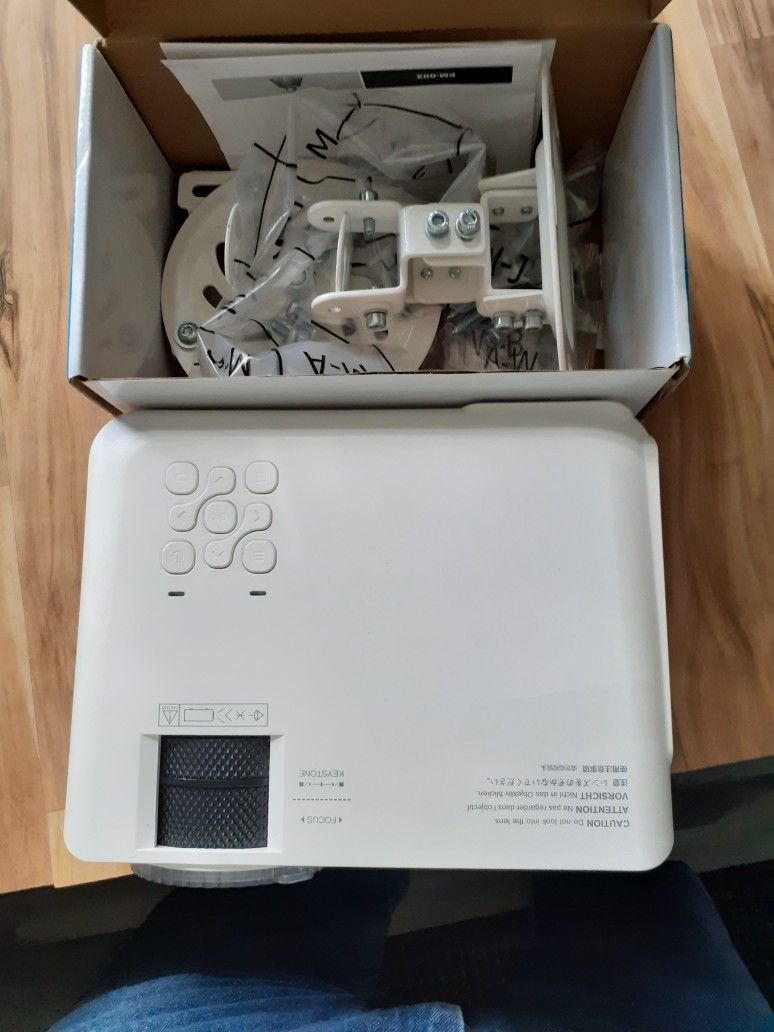 Projector and ceiling mount