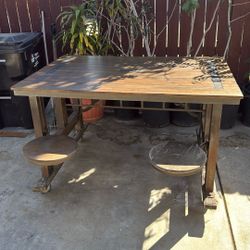 Brown Wood Table 4 Swing Out Seats