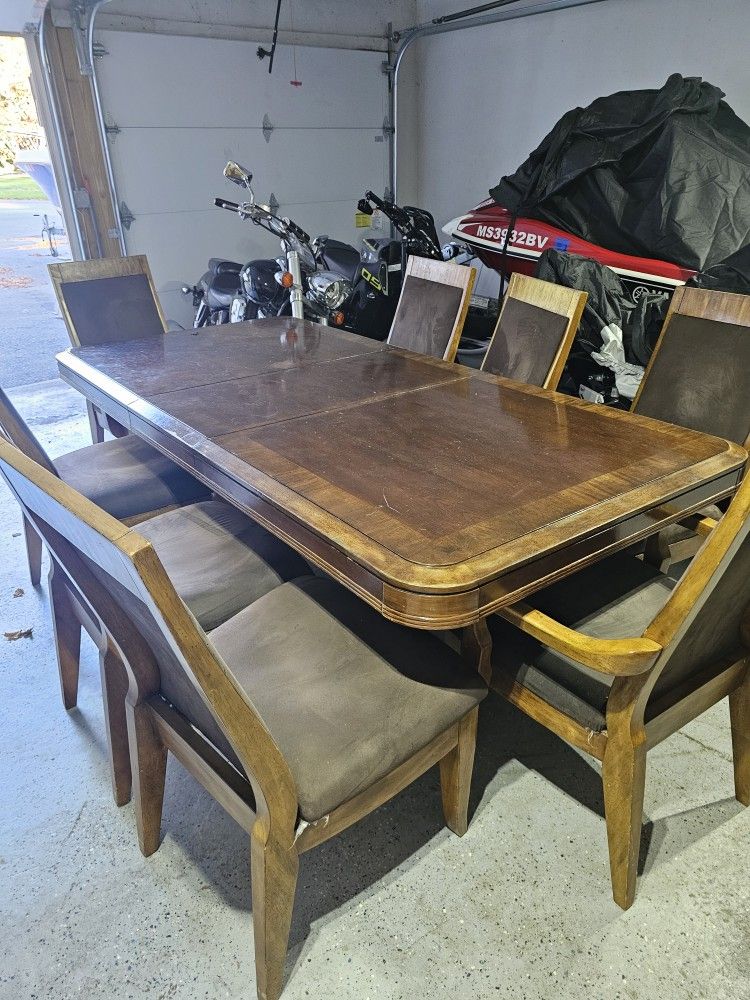 Table And 8 Chairs