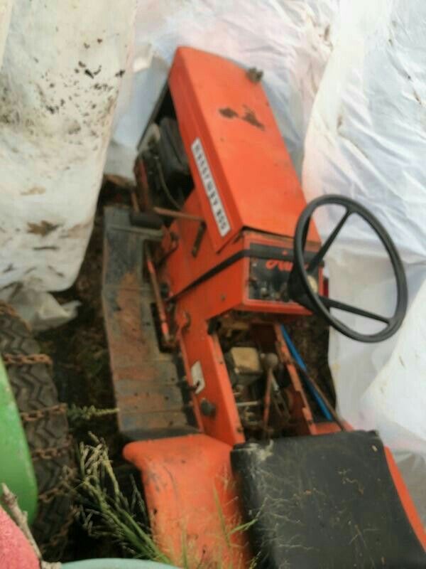 1970s Ariens tractor with 2 plow assemblys, chains ect.