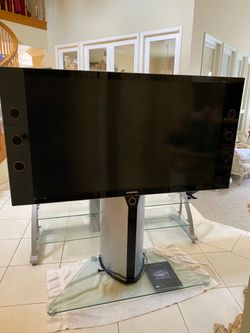 FREE Samsung Flat Screen TV w/ Media Stand