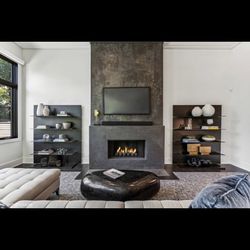 Pair of Salvatore black steel bookshelves - 60"W x 14"D x 74"H.