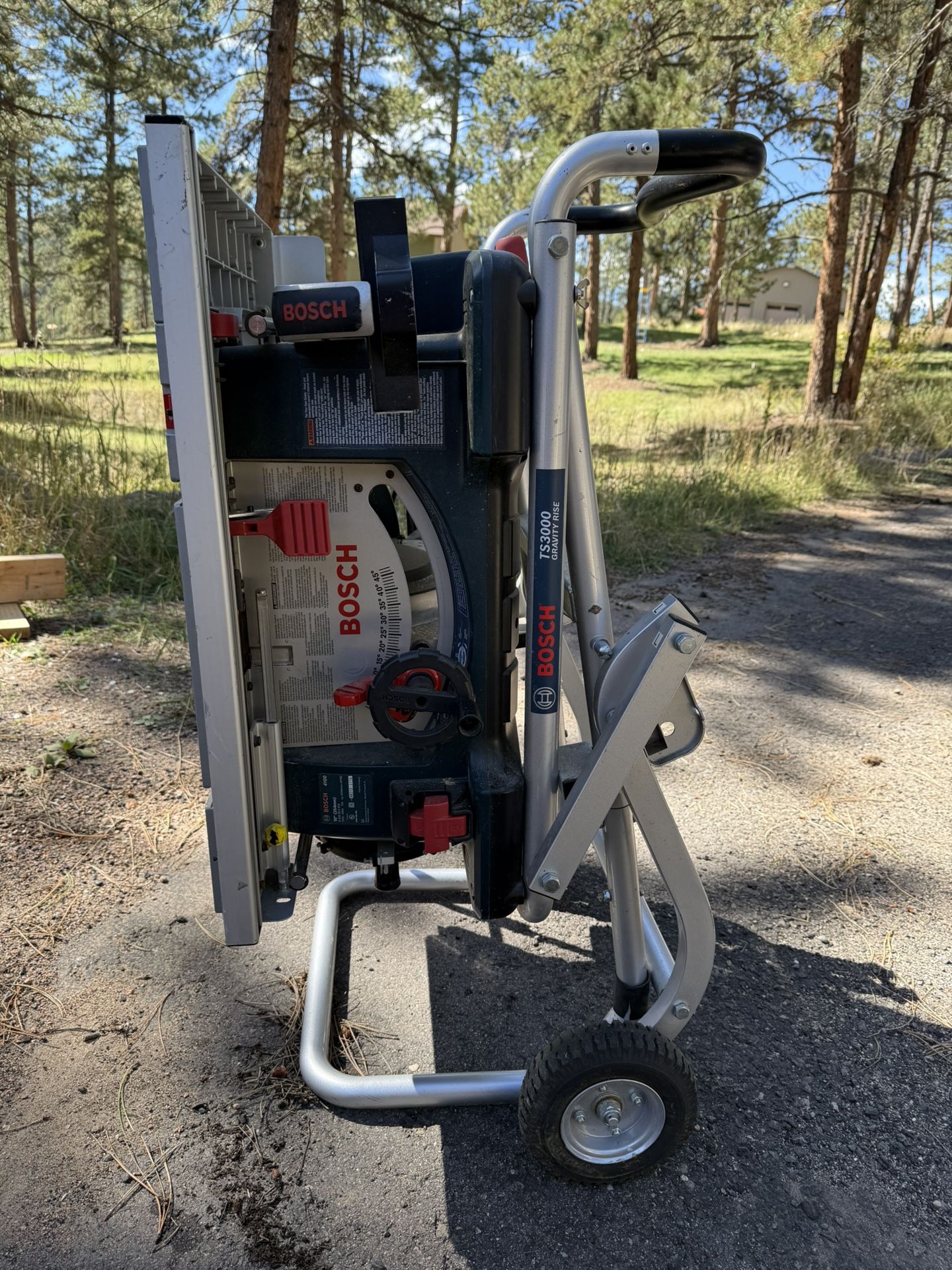 Bosch Table Saw with Stand and accessories.