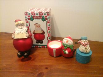 Santa Claus and snowman figures New condition.