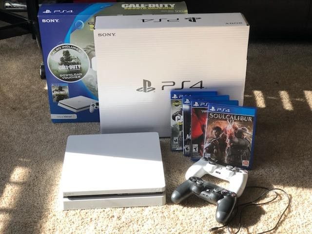 PS4 Slim Glacier White 500GB + two wireless controllers+4 games