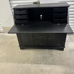 Black solid wood secretary, Desk with many drawers.,49 “ wide , 43” high , 21 depth $125