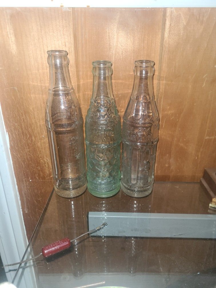 Antique 40s Soda Bottles.