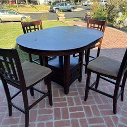 Bar height living / dining room table and chairs