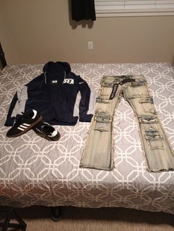 Stacked Flare Distressed Jeans with Tags... ADIDAS SAMBAS... NIKE SEATTLE SEAHAWKS ZIP UP HOODED JACKET