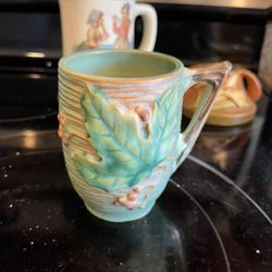 Antique Roseville leaf mug