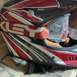 Snell dirtbike helmet and oakley goggles