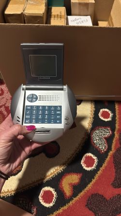 Calculator/alarm Clock/Calendar….NEW