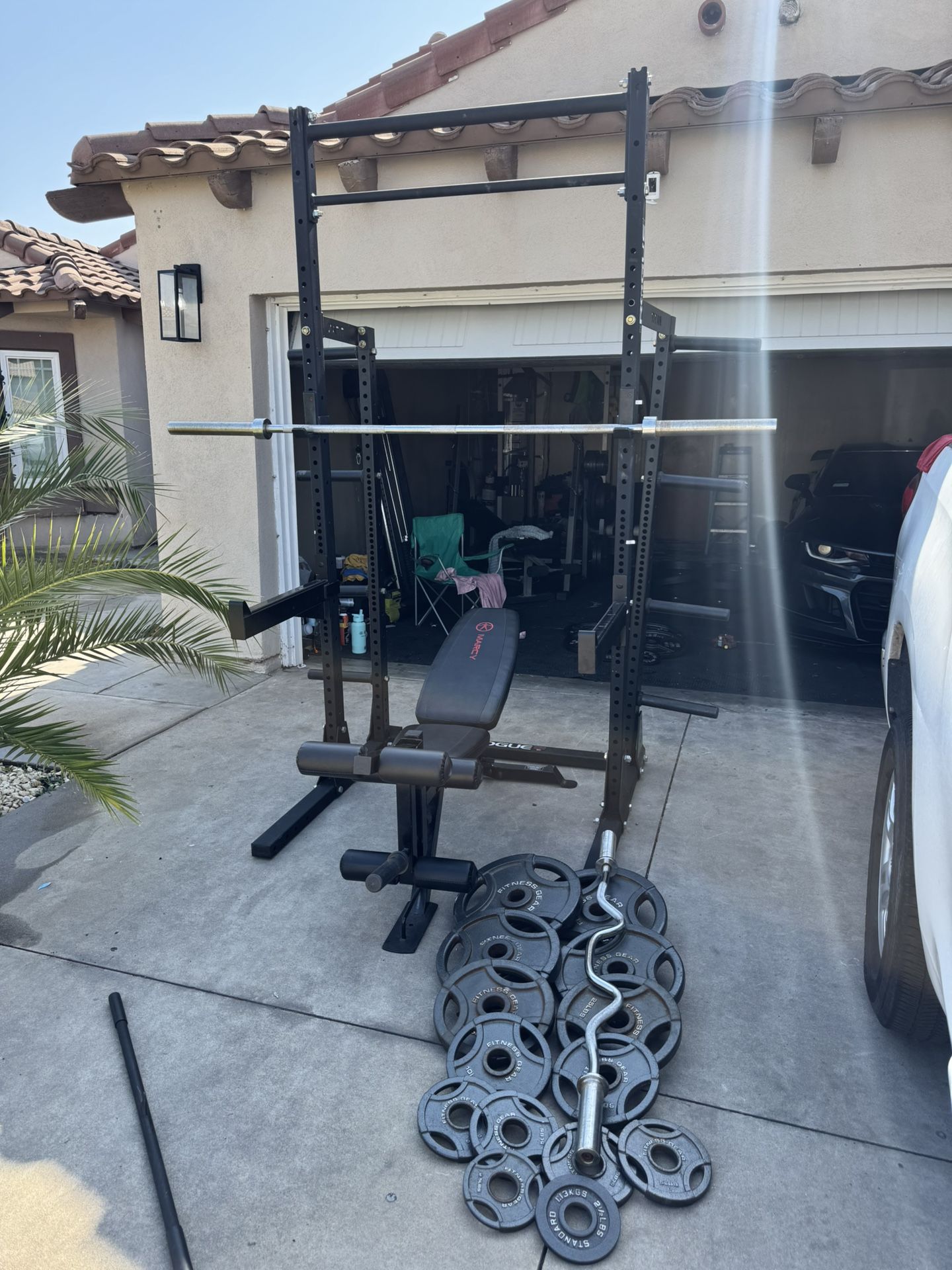 Rogue s-2 squat rack/ Bench press with 7ft 45lbs bar plus 255lbs of Olympic weights and curl bar