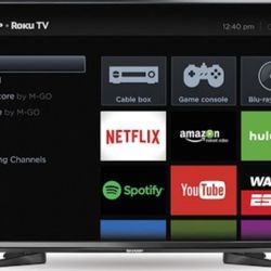   60" SHARP FLAT TELEVISION 