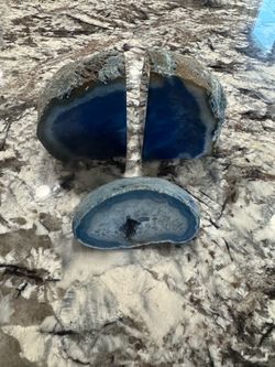 Blue crystal bookends and another decorative crystal