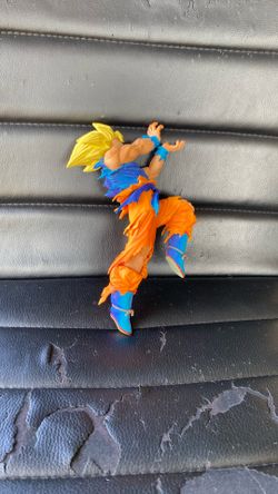 collectible figure of Super Saiyan Goku from the Dragon Ball series
