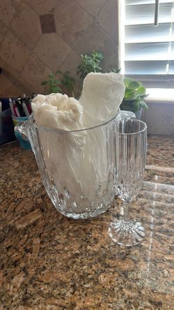 Crystal glass ice bucket and 4 crystal champagne glasses