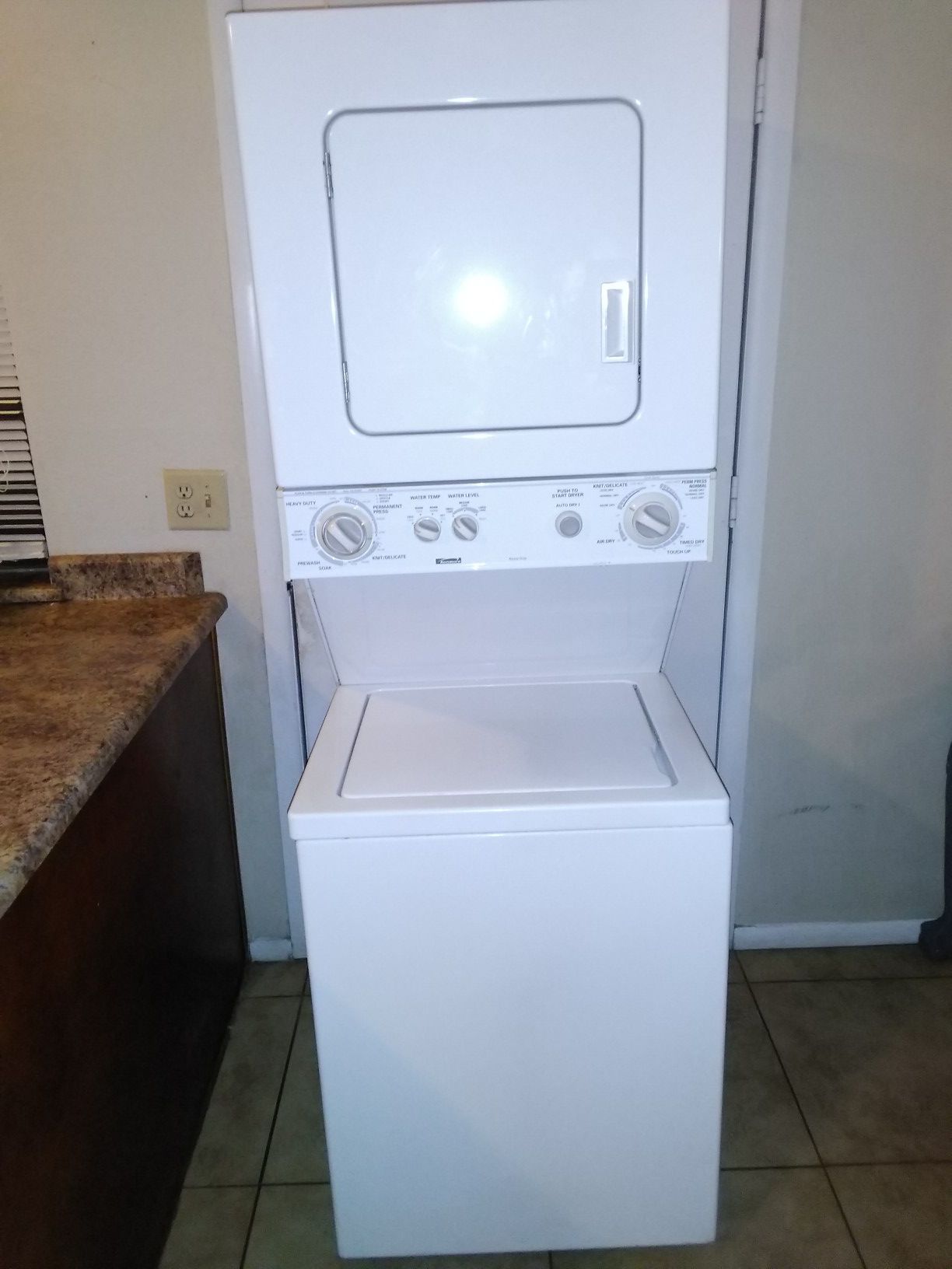 KENMORE, ELECTRIC STACKABLE WASHER AND DRYER COMBO. 24 Wide