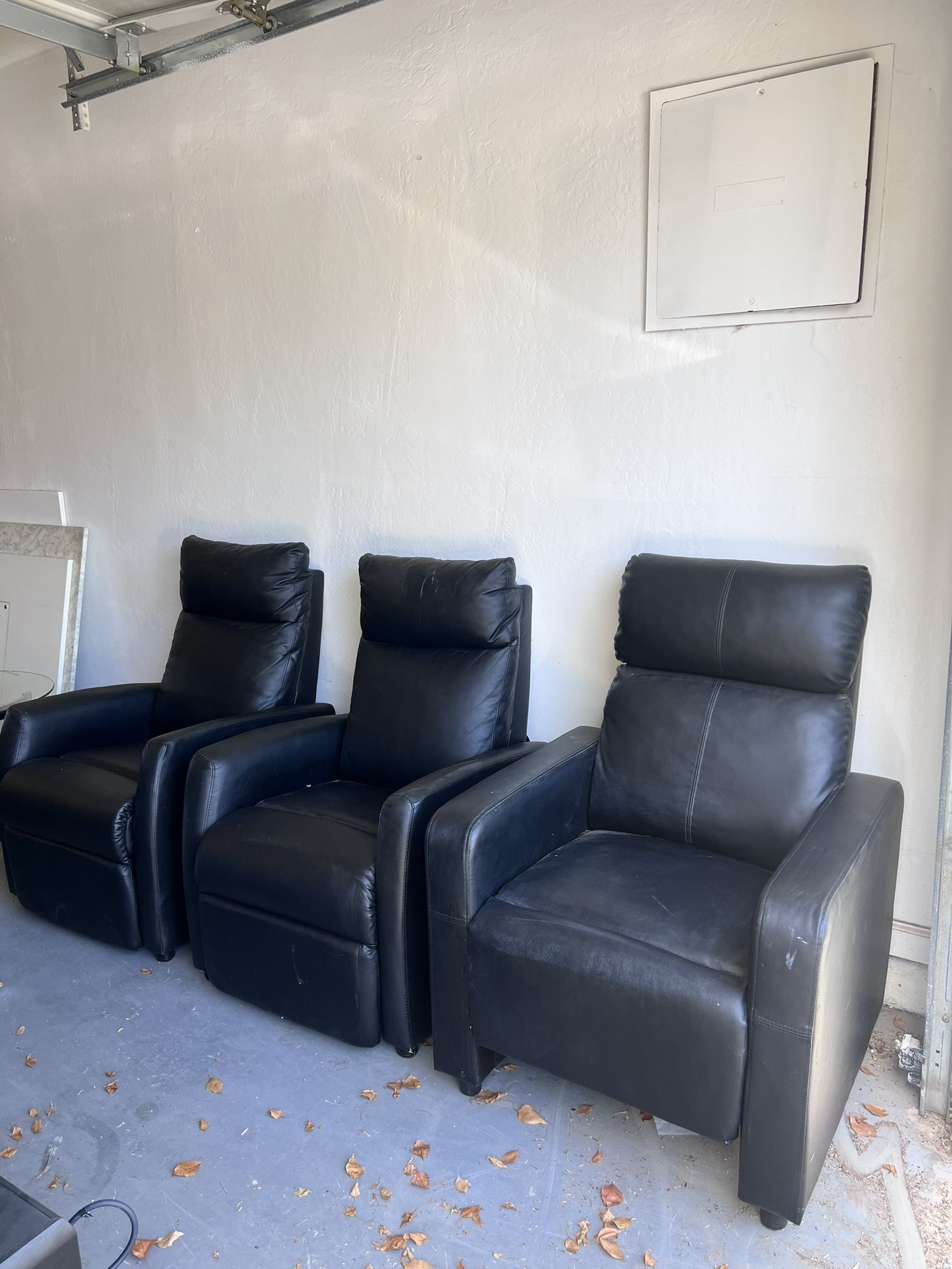 3 Black Reclining Chairs