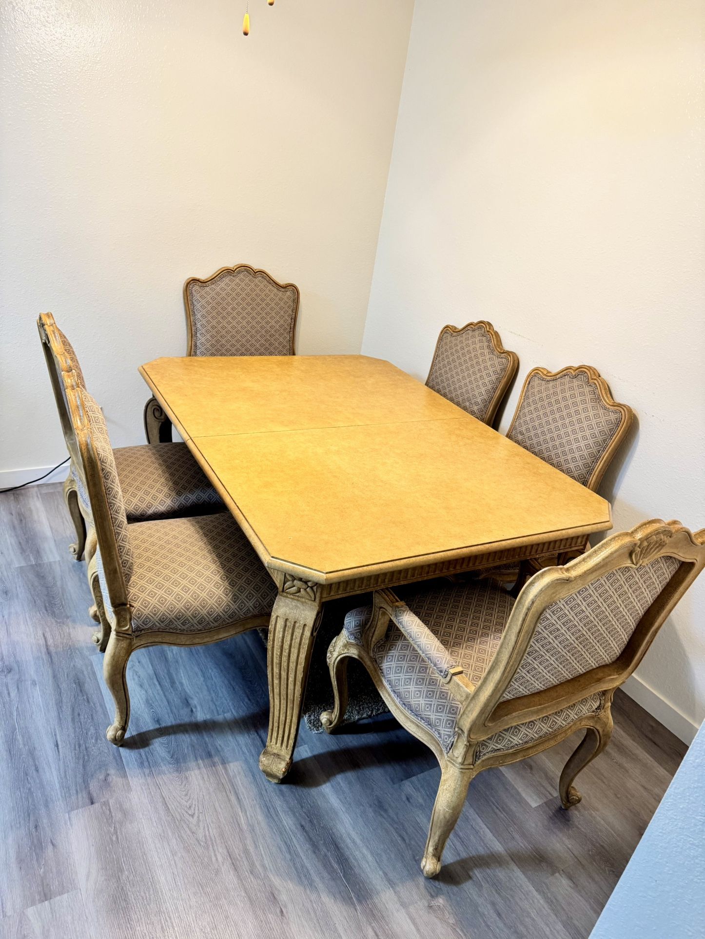 Dining table with chairs.