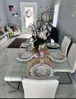 Dining glass table with 4 chairs and a bench