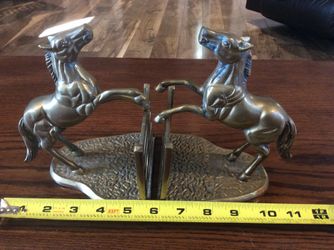 Solid brass horse bookends.