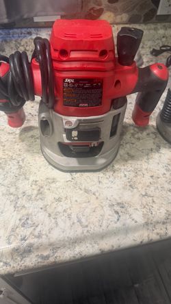 Skil router