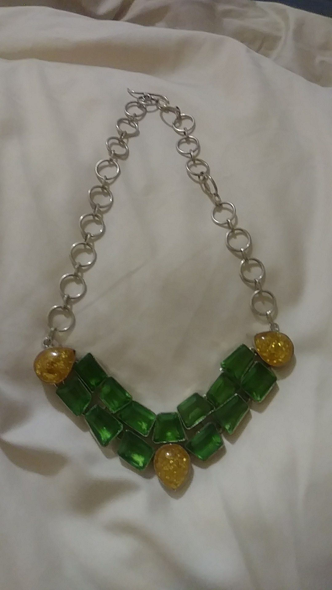 Sterling silver one of a kind artisan crafted adnustable gemstone necklace bezel set are cut peridots with 3 large pears of natural baltic amber, 22"