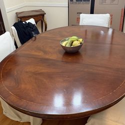 Gorgeous wood table with six chairs included
