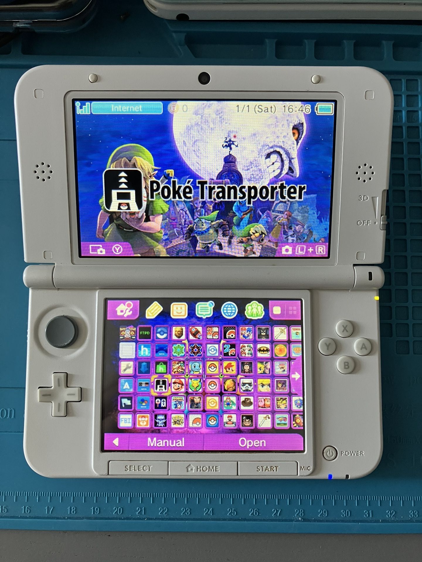 Nintendo Pink 3DS XL With Pokemon Bank, Pokemon DS, Stylus, 64 GB SD Card