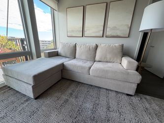 Interchangeable chaise sleeper sofa
