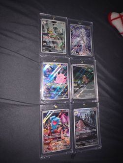 Pokemon cards for sale! Make an offer for all the cards and plushies together as a lot!