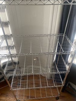 Metal rack/ shelves with wheels