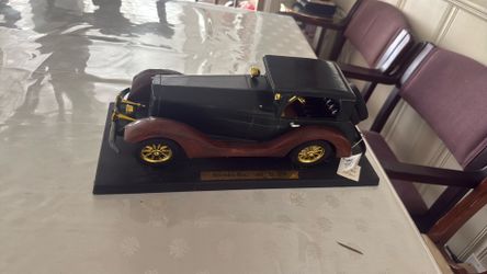 vintage handcrafted wooden model car