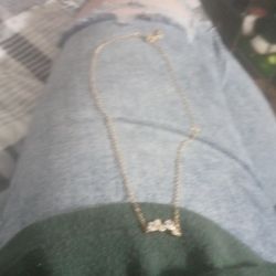 Chain Is 14 Karat Gold And The Charm Is Cubic Zirconian