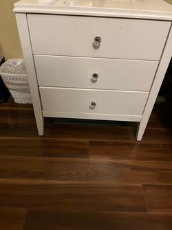 White bedside table