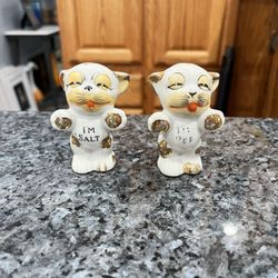 Vintage Shiny gloss Bonzo Cat pair of salt and pepper shakers. Marked I'm Salt, and I'm Pepper. Both are marked Japan on the bottom. Preowned no stop