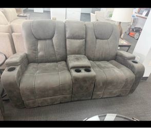 Gray reclining sofa and matching glider reclining loveseat