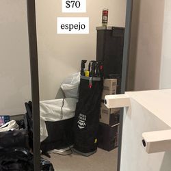 Long brown frame mirror